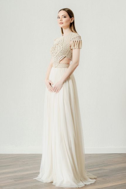 Bride in one of the Boho - Chic wedding dresses by Atelier Zolotas, 'Galatea Opulence'