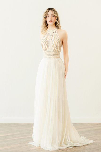 Bride in a Halter Neck Boho Wedding Dress named 'Lyra'